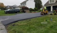 Ellijay GA asphalt repair professionals working on a driveway project
